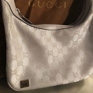 Authentic Gucci monogram metallic Silver bag